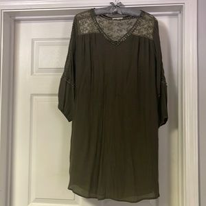 Great dress for fall. This Olive green dress has mid sleeves with lace.